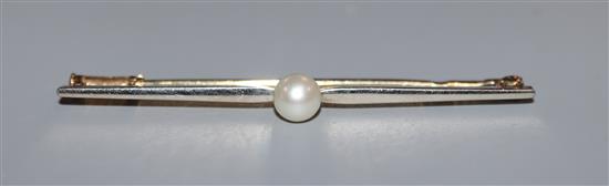 A Peter Carl Faberge two-colour bar brooch set with a single pearl, 50mm.